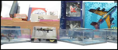 A collection of Corgi aviation relating diecast model planes to include; B-178 Sally B, Confederance