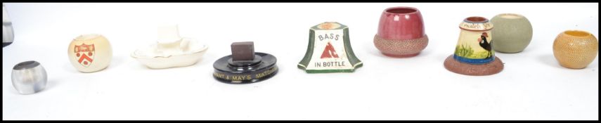 A collection of vintage match strikes to include Bass ' In Bottle ' by Mintons, Carltonware, Torquay
