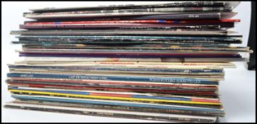 A collection of vinyl long play records to include Wings, The Kinks, 10cc, Status Quo, Elton John,