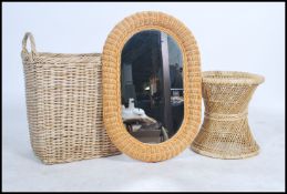A collection of whicker items to include a large whicker log basket / bin, a whicker stool and a
