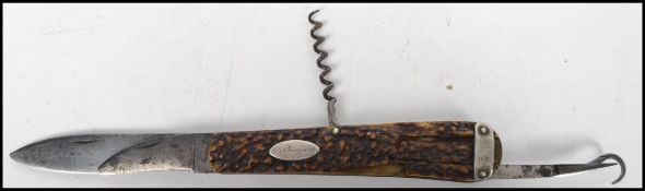 A 19th century early Victorian stag horn handled multi tool pocket knife, with silver engraved
