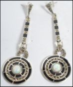 A pair of good Art Deco style silver and enamel drop earrings. Each earrings with opal drop
