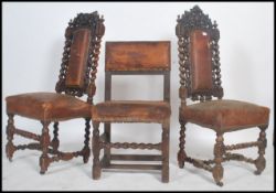 A pair of 19th century Carolean revival oak and leather hall chairs having barleytwist columns and