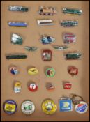 A collection of 20th century enamel badges relating to transport to include railway, shipping,