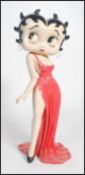 A large floor standing art deco style Betty Boop figurine featuring the iconic character in a