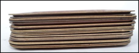 A collection of 20th Century canteen dinner tray being mahogany veneered , varying applied stamps to