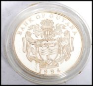 A Bank of Guyana silver proof $50 dollar coin to commemorate the Royal visit to Guyana in February