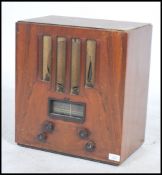 A vintage 20th century walnut cased Art Deco  PYE valve radio, hessian covered speaker to front