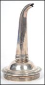 A 19th century Georgian silver hallmarked wine funnel makers CF with Georgian head. Measures 10 cm