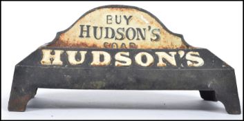 A cast metal point of sale advertising dog water bowl for Hudsons Soap, finished in a two tone