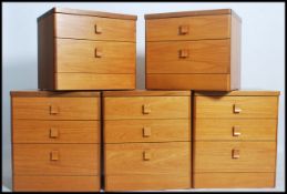 A group of five vintage 20th century Stag furniture small chest of drawers / bedsides of teak