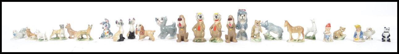 A collection of Wade whimsies collectable Disney / Hanna - Barbera figures to include two Yogi