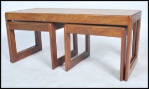 A vintage retro 20th century Danish influence tile top coffee table of rectangular form with two