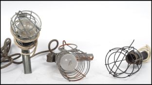 A good group of vintage 20th century retro industrial inspection lamps with clamp ends and wire
