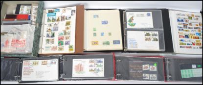 A large collection of first day covers and stamps