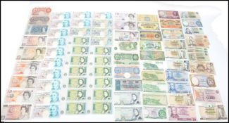 A large collection of out of circulation British banknotes to include £50, £20, £10, £5 £1 various