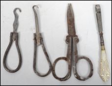 A group of 19th century travelling metamorphic folding vanity items to include scissors, button hook