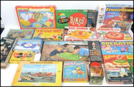 A collection of vintage board games to include Waddingtons Table soccer, Bingo, Beetle Drive,