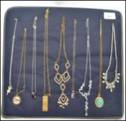 A group of vintage 20th century costume dress jewellery necklaces to include silver white metal