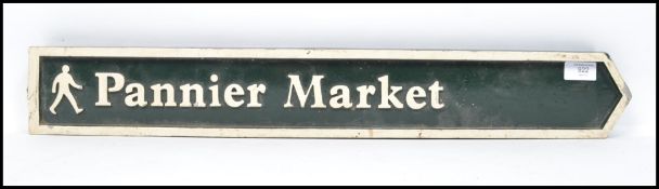 A vintage 20th century North Devon street road metal sign reading Pannier Market having a dark green