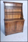 A 19th century large French country oak dresser ra