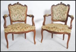 A good pair of French fauteil's / armchairs in mahogany having reeded, carved legs and shaped
