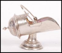 A silver ( tested ) French hallmarked table salt in the form of a coal purdonium having stepped base