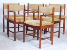 A set of six retro teak wood Danish inspired 1970s dining chairs consisting of two carvers and