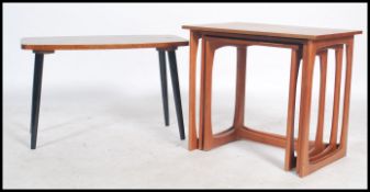 A vintage 20th century Danish style teak wood nest of tables ( 3 ) toegether with a 1960's coffee