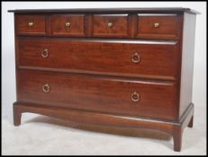 A Stag bedroom chest with four short drawers over