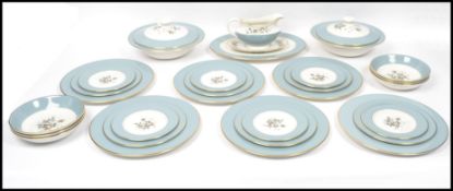 A vintage 20th century Royal Doulton extensive ceramic six setting dinner service in the Rose