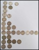 A collection of thirty silver three pence coins dating from the 19th century and the earlier part of