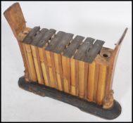 Musical Instruments: A vintage believed 19th century Japanese Gamelan of bamboo construction