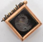 A 19th century Victorian mourning locket forget me not having a black gate onyx intaglio wax seal of