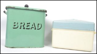 A retro 1950's green enamel bread bin having central notation with lid together with a 1980's