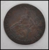 A rare British 1795 18th century gaming token believed to be by William Lutwyche. The copper