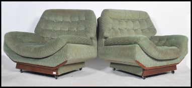 A pair of retro 20th century modular style armchairs in the manner of Ligne Roset. Each with