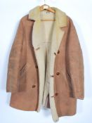 A vintage 20th century gents and ladies three quarter length sheepskin coats / jackets with fleece