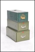 A group of three vintage mid 20th century industrial stacking index filing cabinets in original