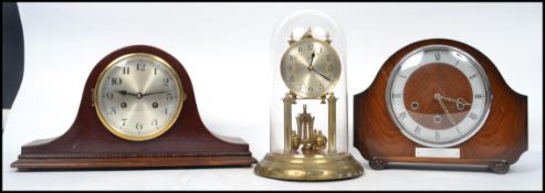 A collection of items to include two mantle clocks one with notation on 45 years service from BR, an