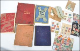 A good collection of vintage stamps in albums dating from the 19th century to include many Great