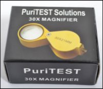 A new ( unused ) jewellery loupe 30x magnifier by Puritest. Measures 2.5cm high, 4.5cm deep & 5.