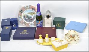 A collection of vintage boxed ceramics to include a Swarovski paperweight, Carlton Ware, Royal