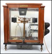 A cased set of electronic Oertling Releas-o-Matic scientific balance scales dating to the mid