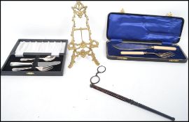 A pair of silver plated fish servers in the presentation case together with other items etc ( see