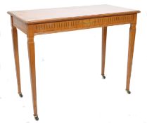 A 19th century Victorian satinwood side hall / console table in the Adams style raised on square