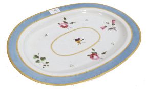 A 19th century Chamberlain Worcester oval shaped pattern meat plate platter being painted in