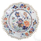 An early 19th century Masons Stone China Imari pattern plate  having scalloped borders with gilded