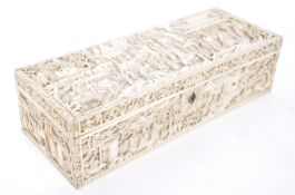 A  19th century Chinese Canton ivory box of rectangular form being carved heavily in relief with