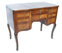 A 19th century French Louis XV revival mahogany and kingwood Poudreuse ladies dressing table. Raised